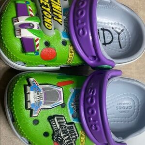 CROCS Green and Purple Slippers with Buzz Lightyear Theme